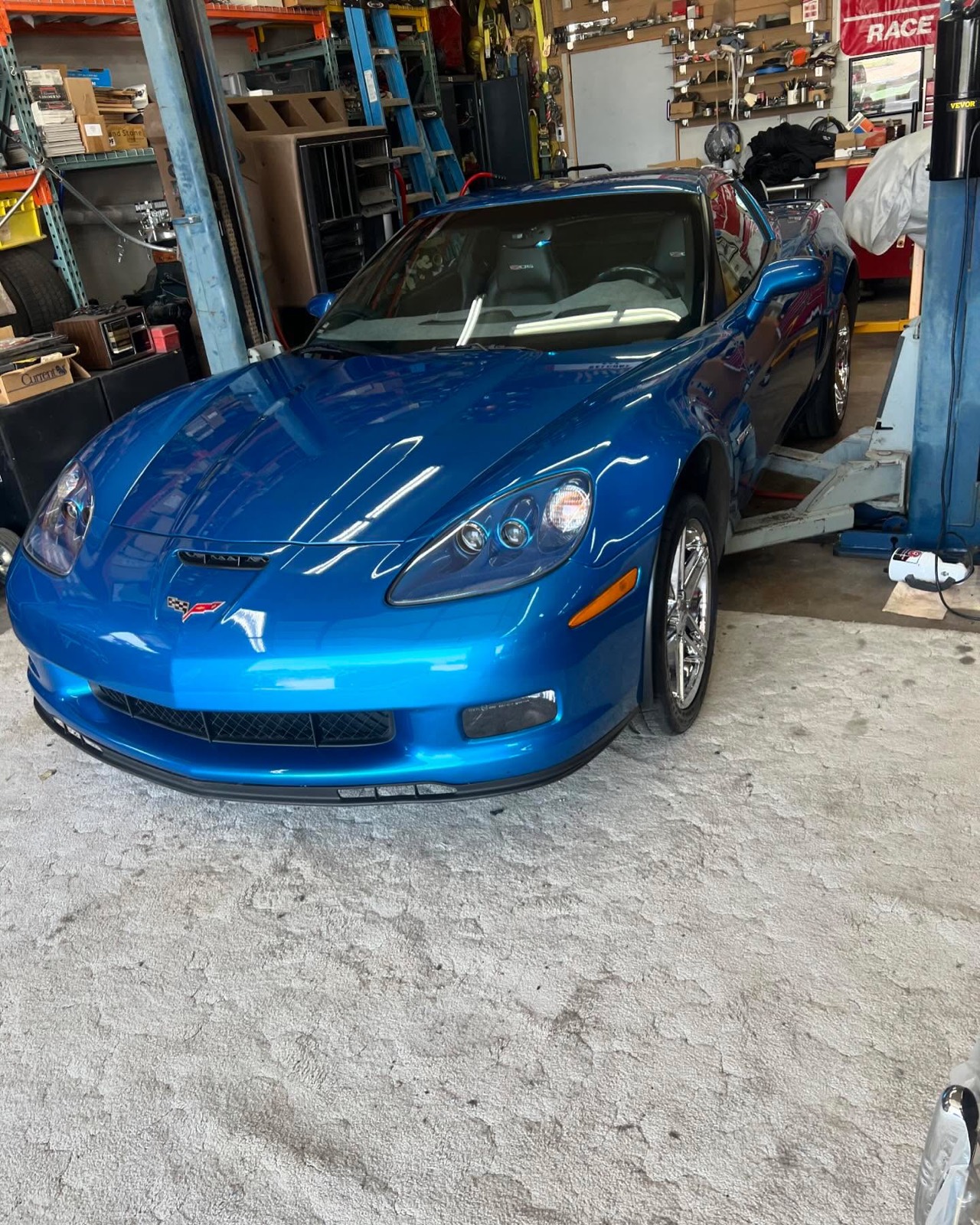 Blue C6 Corvette front three-quarter after a full detail