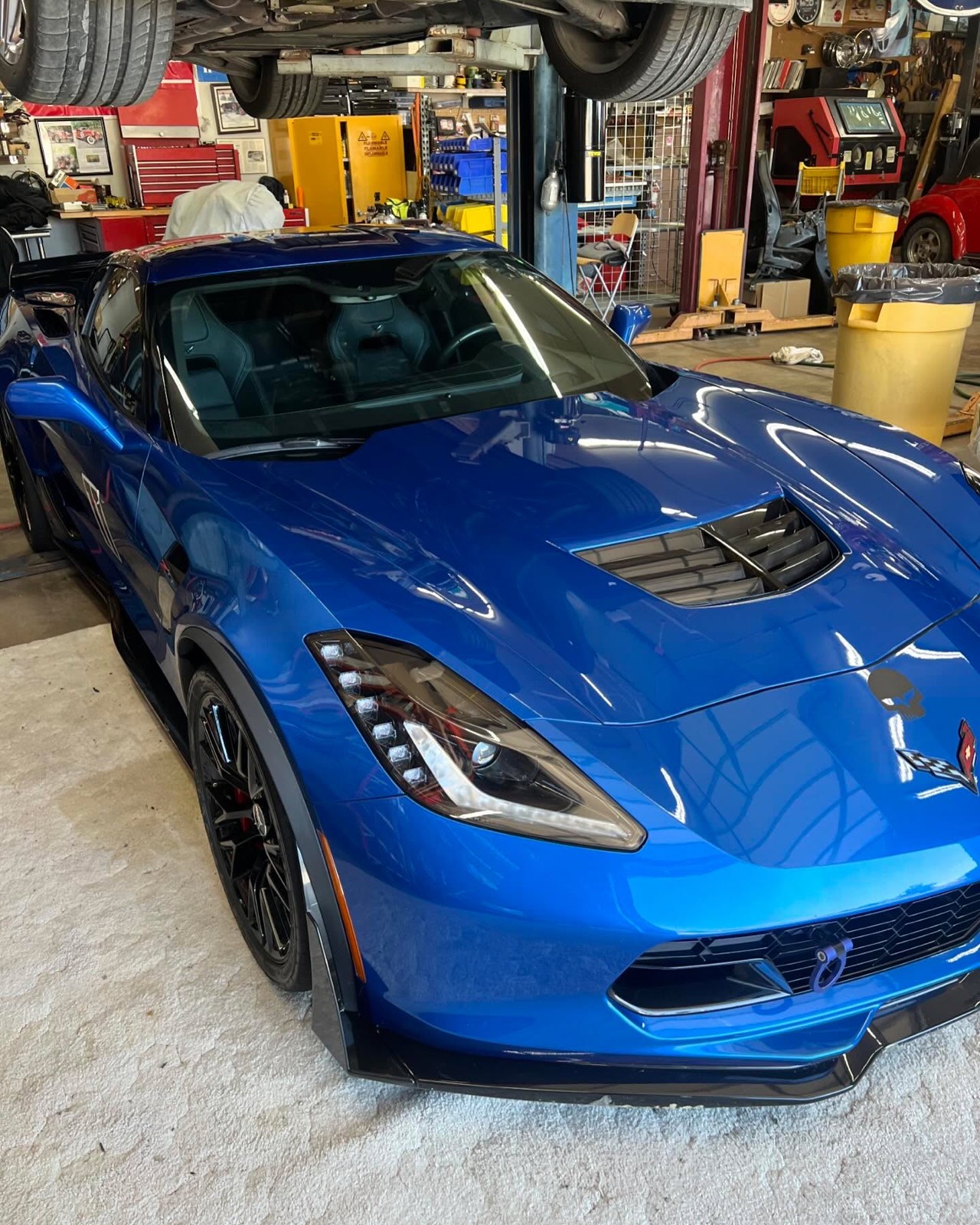 Blue C8 Corvette front three-quarter, freshly detailed