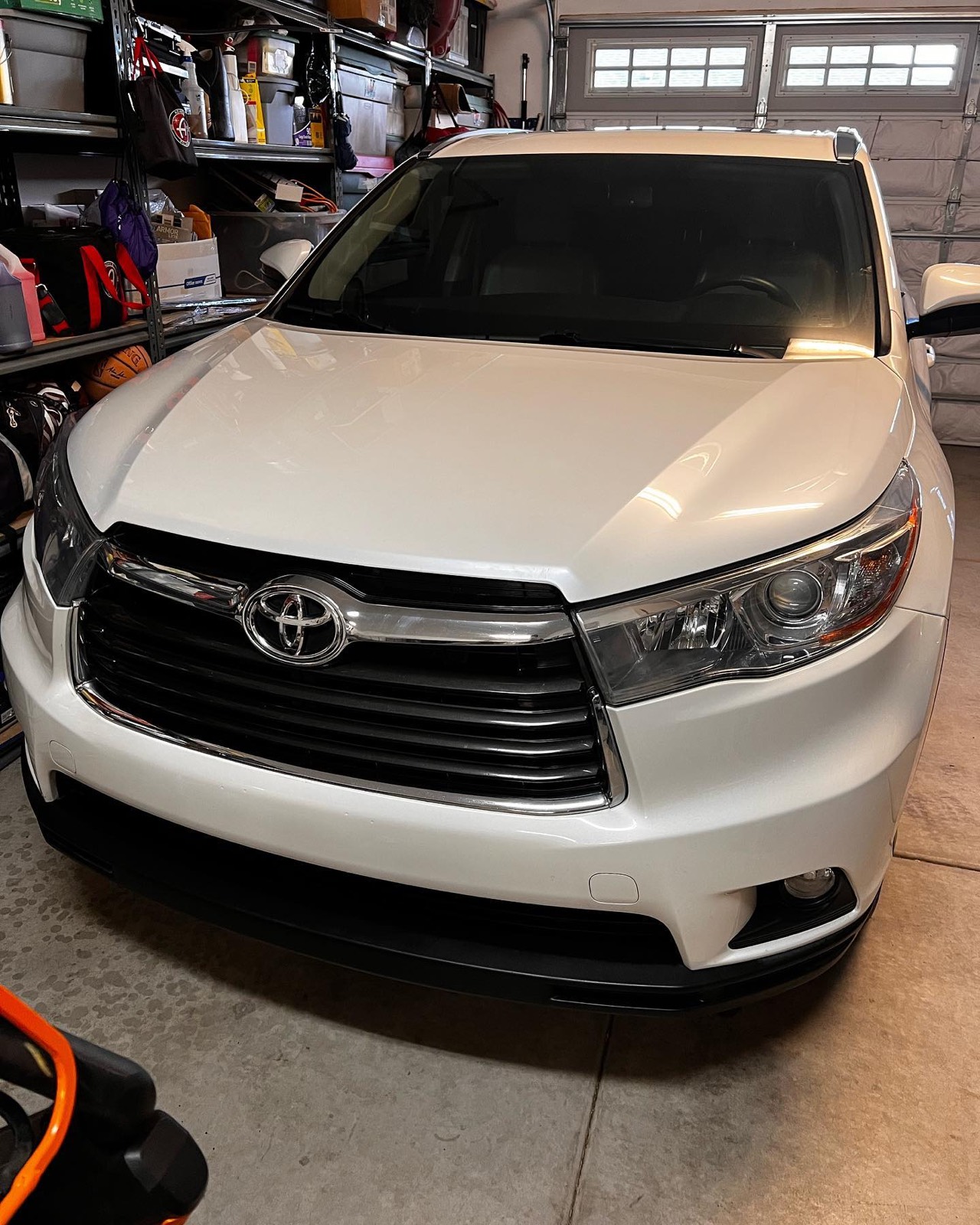 White Toyota Highlander front after a full detail