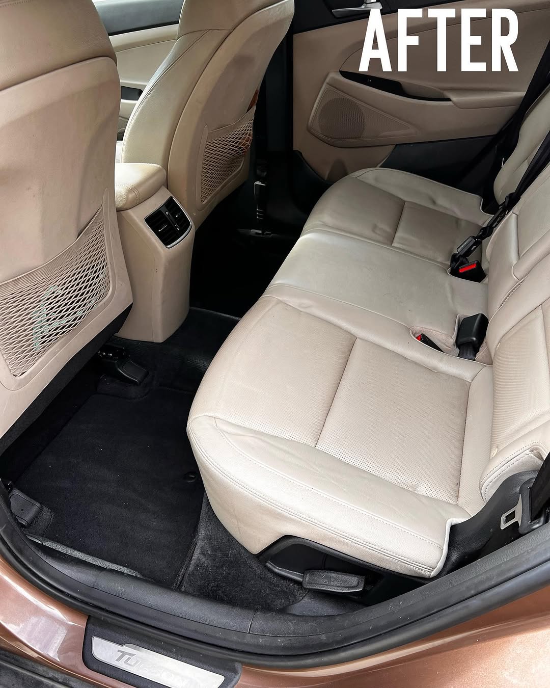 Hyundai rear seats after detailing — clean leather and carpet
