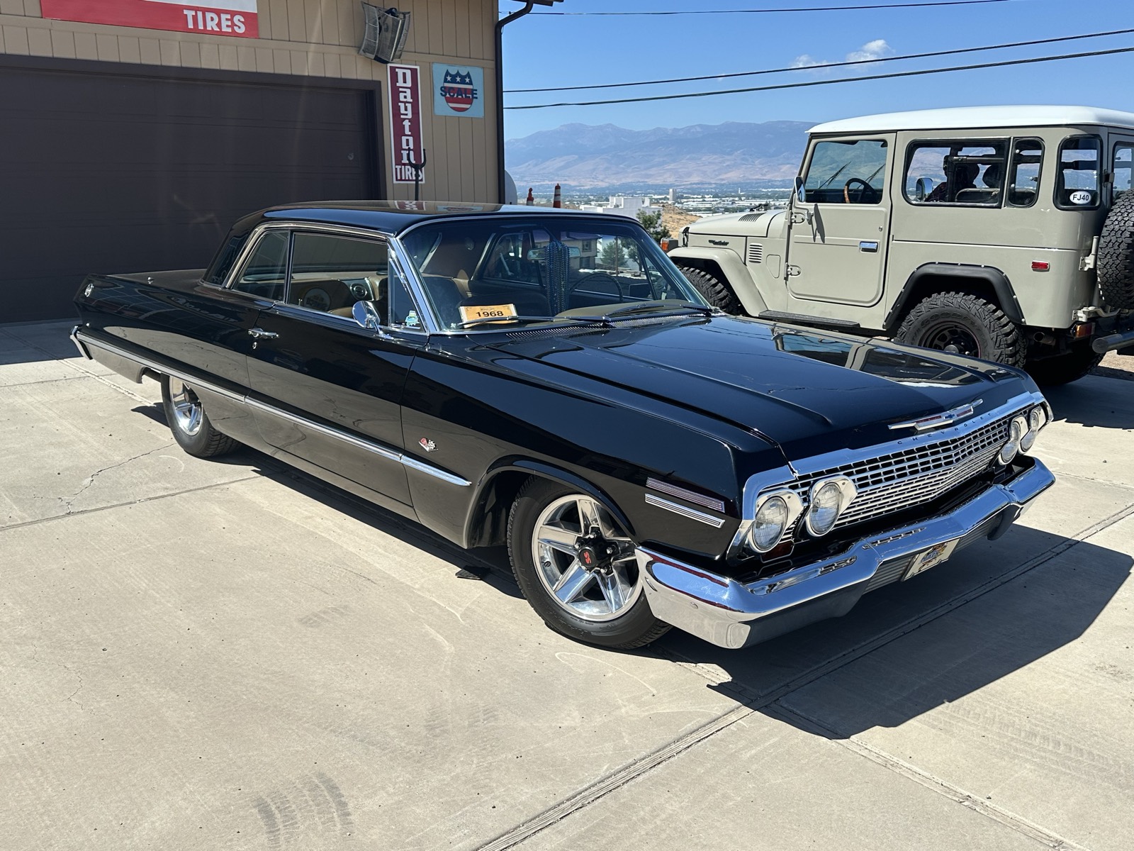 Classic black Chevrolet Impala front three-quarter after detailing