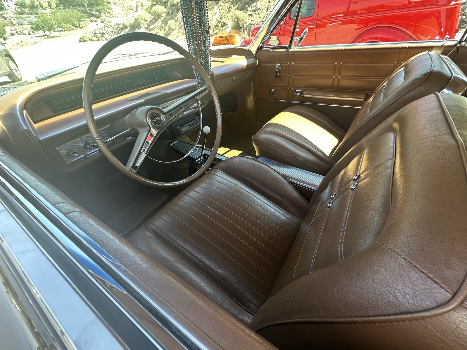 Impala brown leather interior and steering wheel after detailing