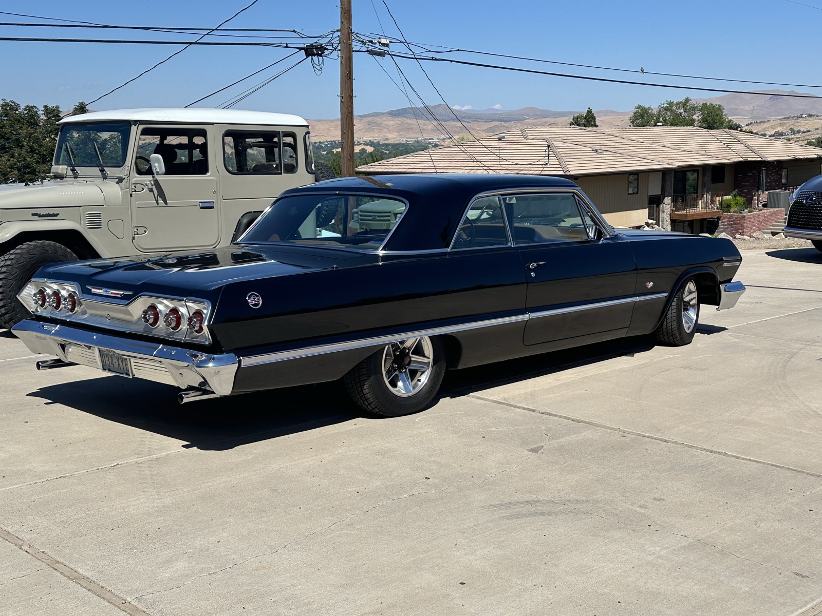 Classic Impala rear three-quarter, glossy black paint