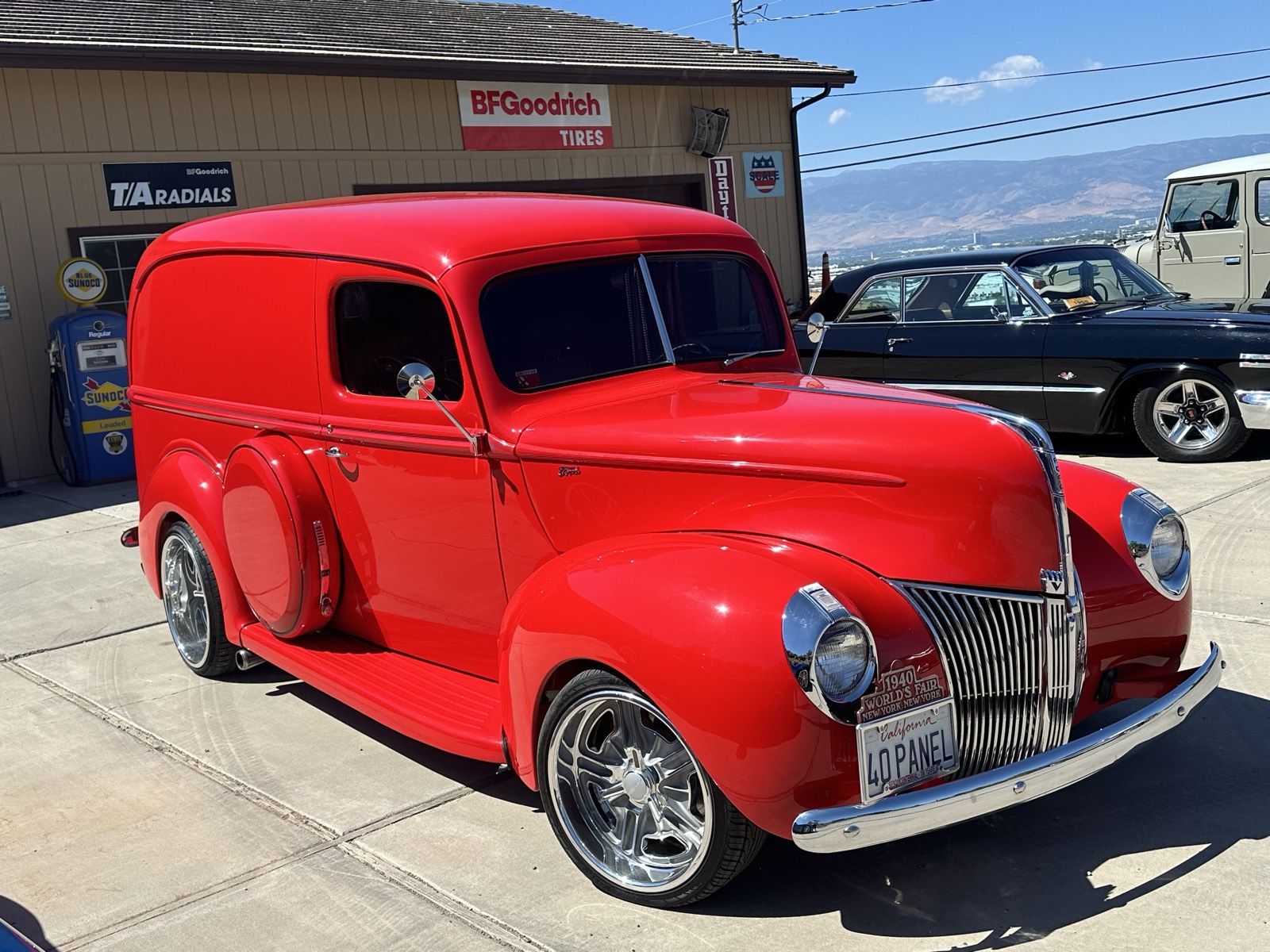 Classic red panel truck front three-quarter, glossy finish