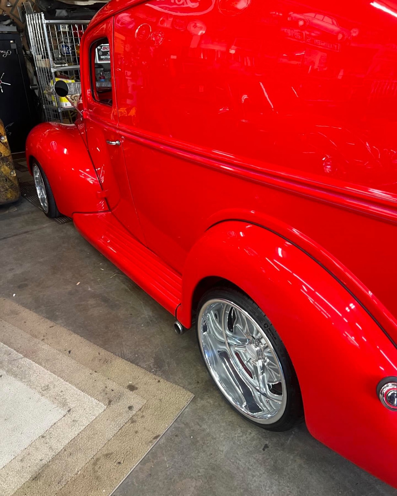 Classic red panel truck fender and wheel